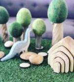 summer green felt tree with wooden pebbles and dinosaur