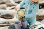 child playing on beach