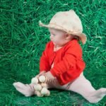 Baby playing with Beads