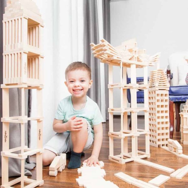 child playing with Kubi Dubi Wooden Blocks