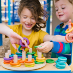 kids playing with rainbow rings